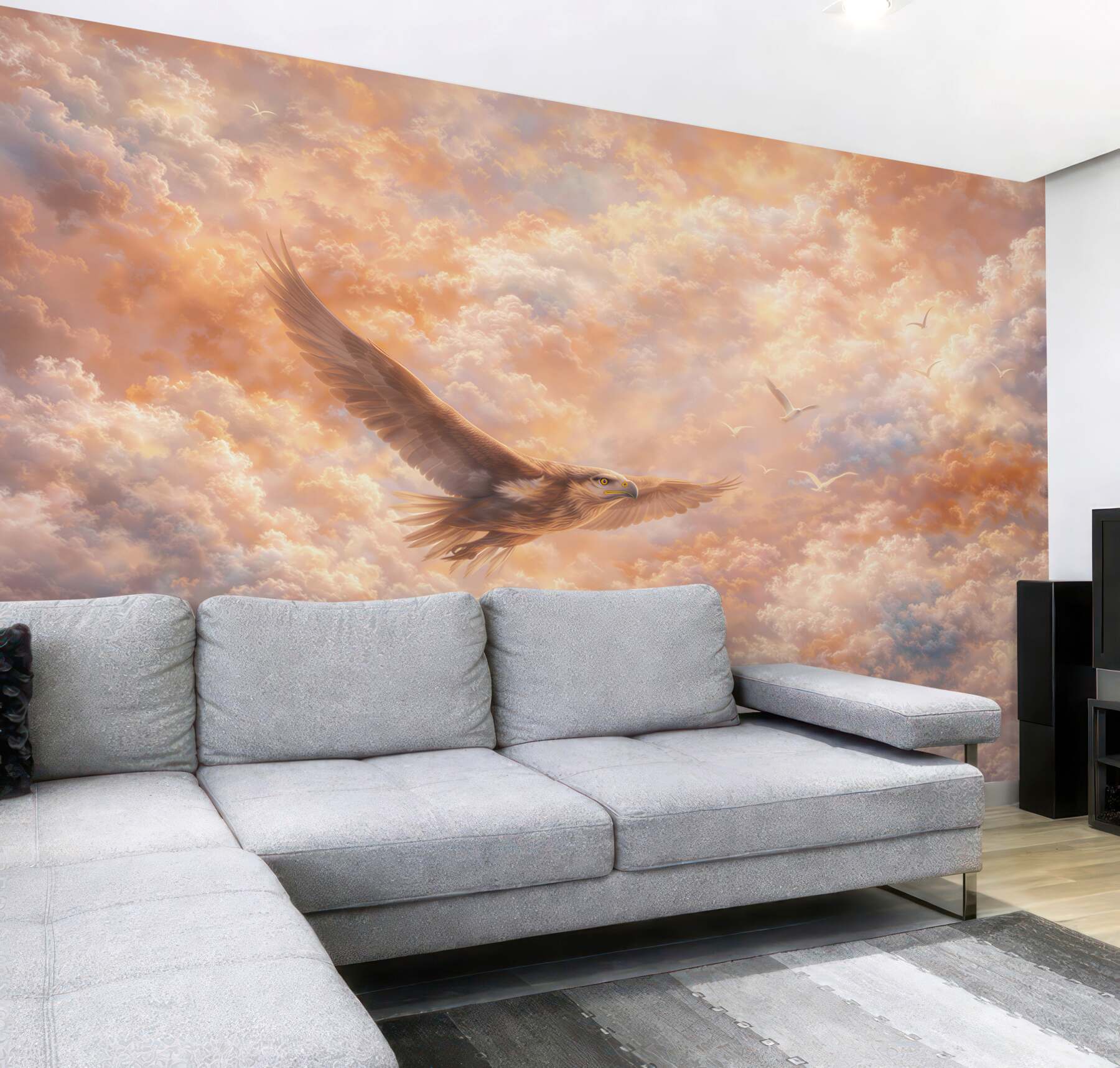 Fototapeta orzeł w chmurach o zachodzie słońca panoramiczna